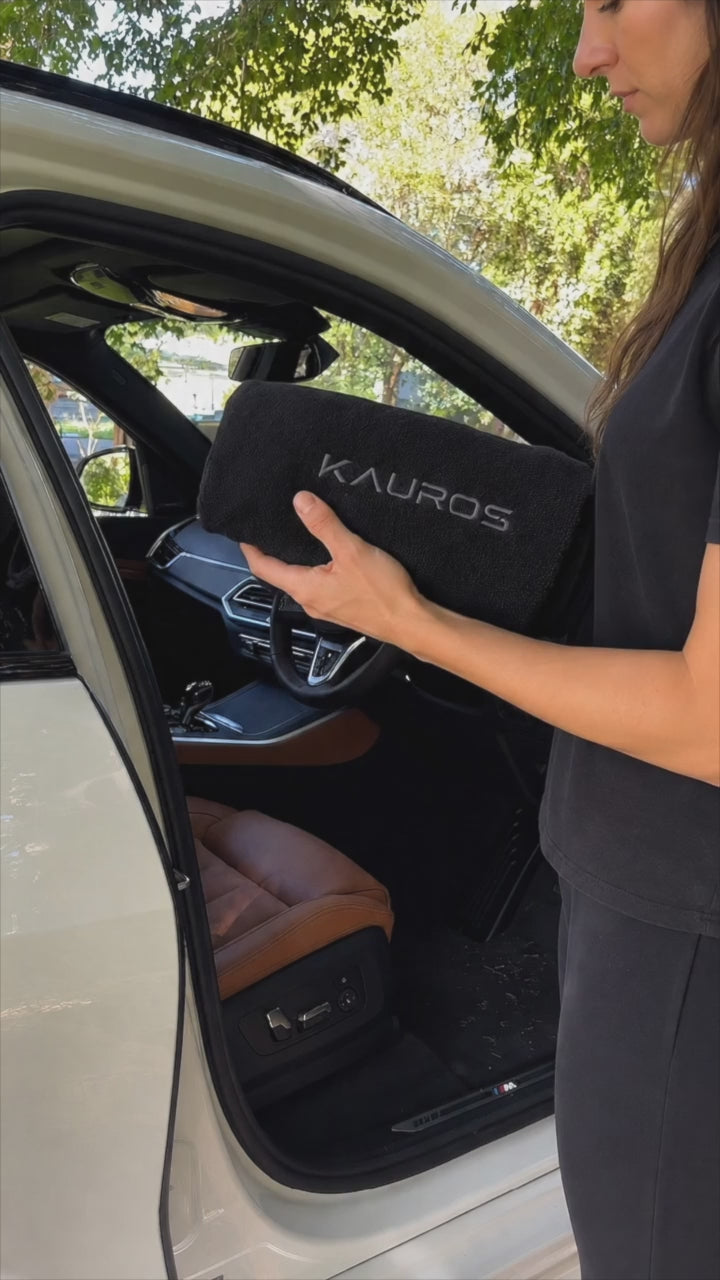 Premium waterproof car seat cover installation and protection demonstration in a luxury vehicle